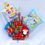 Dulces picosos globos y peluche