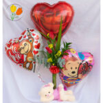 Globos flores y peluche