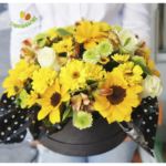 Caja de girasoles y rosas