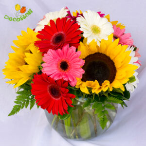 Girasol y gerbera en florero de vidrio