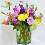 Matiola lilis y rosas en vidrio