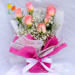 Rosas y babys breath en ramo