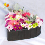 Corazon de madera con flores